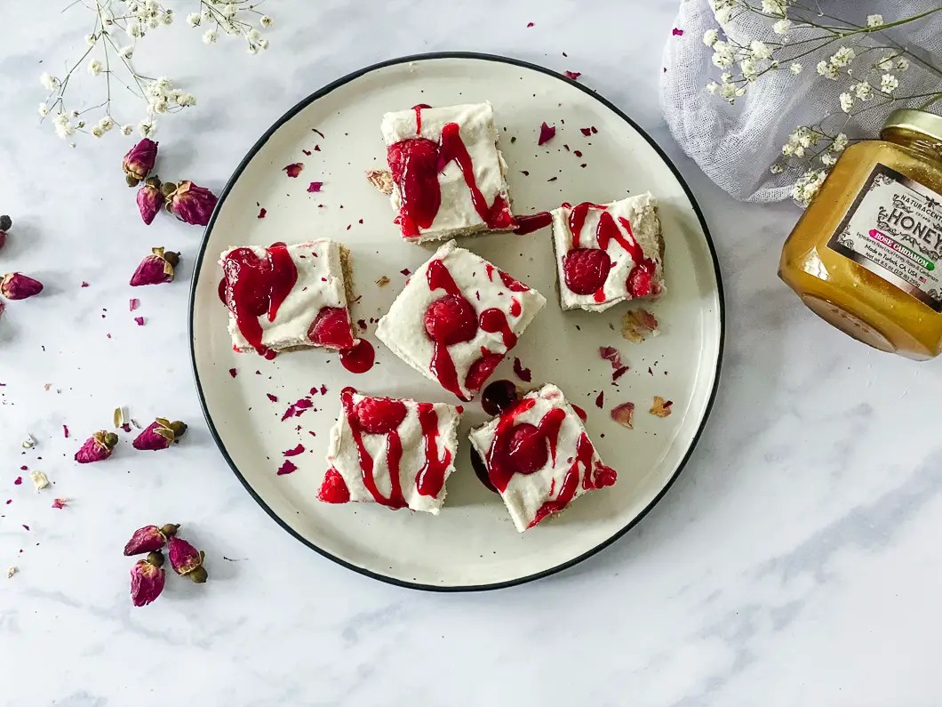Raspberry Cheesecake Bites with Rose Cardamom Honey