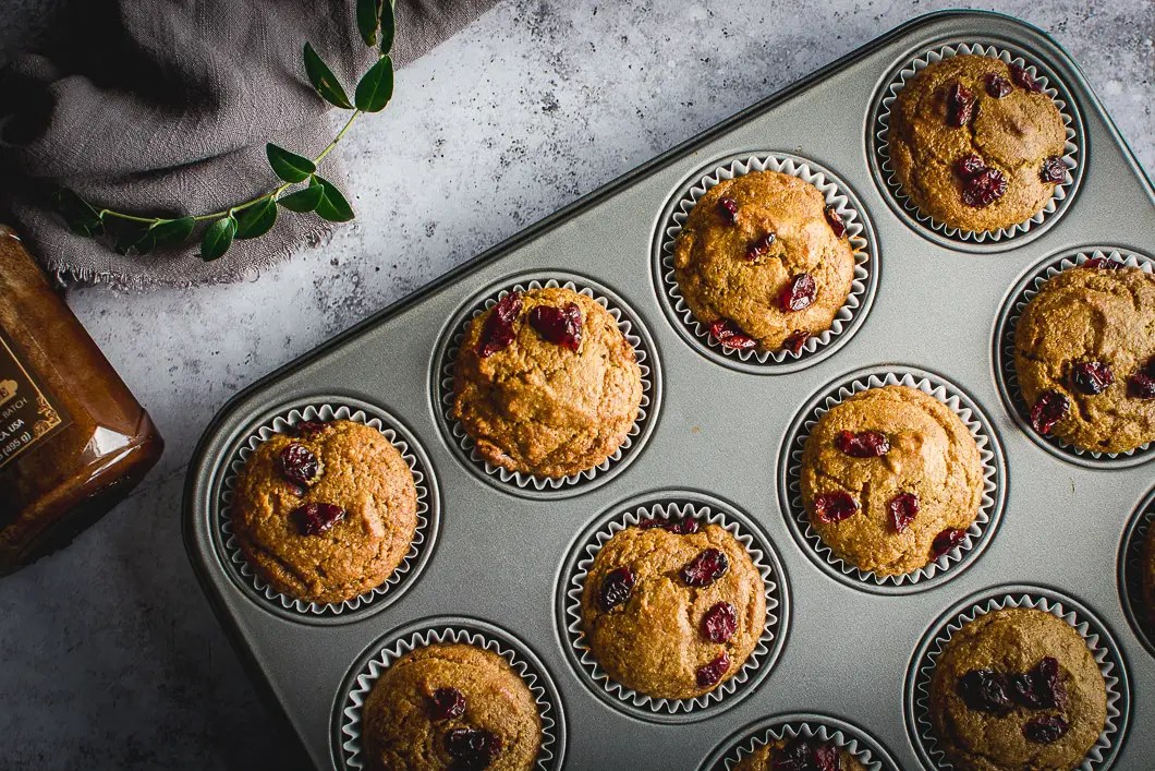 Healthy Grain-Free Cranberry Pumpkin Spice Muffins in muffin tin