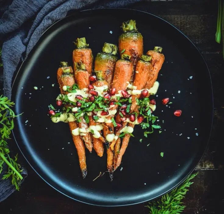 Roasted Carrots With A Simple Orange Tahini Sauce and Pomegranate