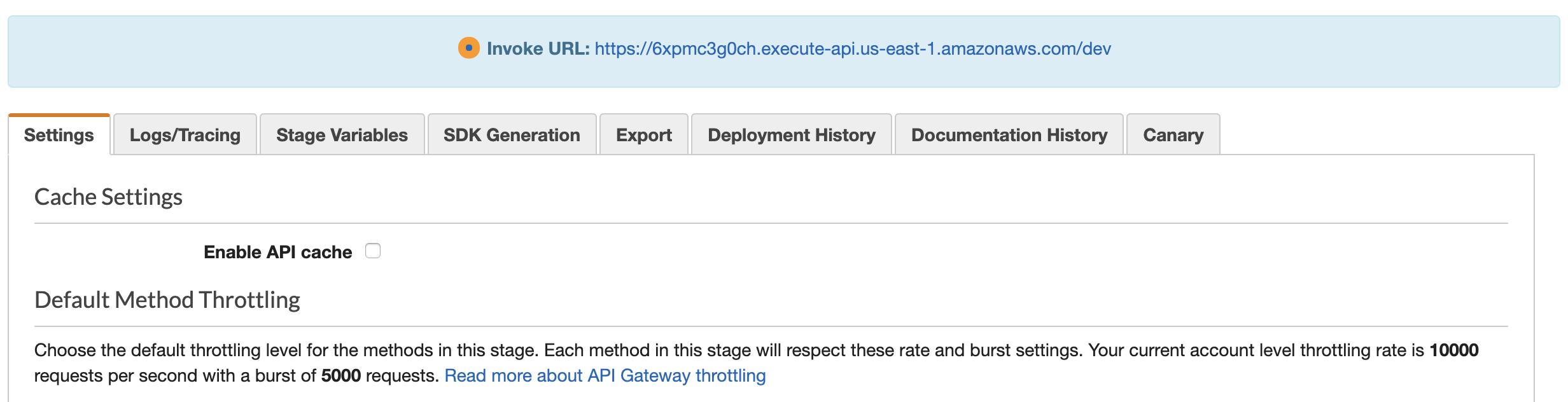 The AWS console showing the Settings tab which includes Cache Settings. Above that is a blue notice that contains the invoke URL.