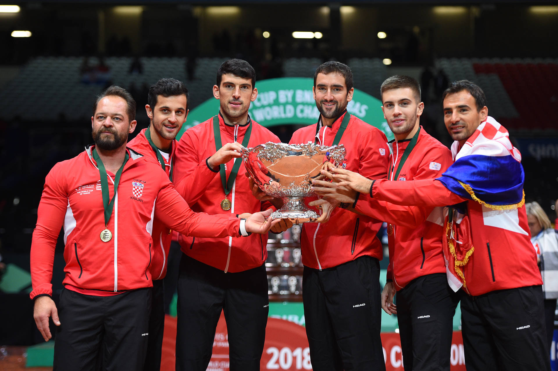 The Croatian team holding up the Davis Cup after winning the tournament in 2018.﻿