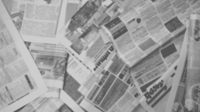 old-newspapers-scattered-on-floor How to Fix a Recliner Footrest in Two Different Ways