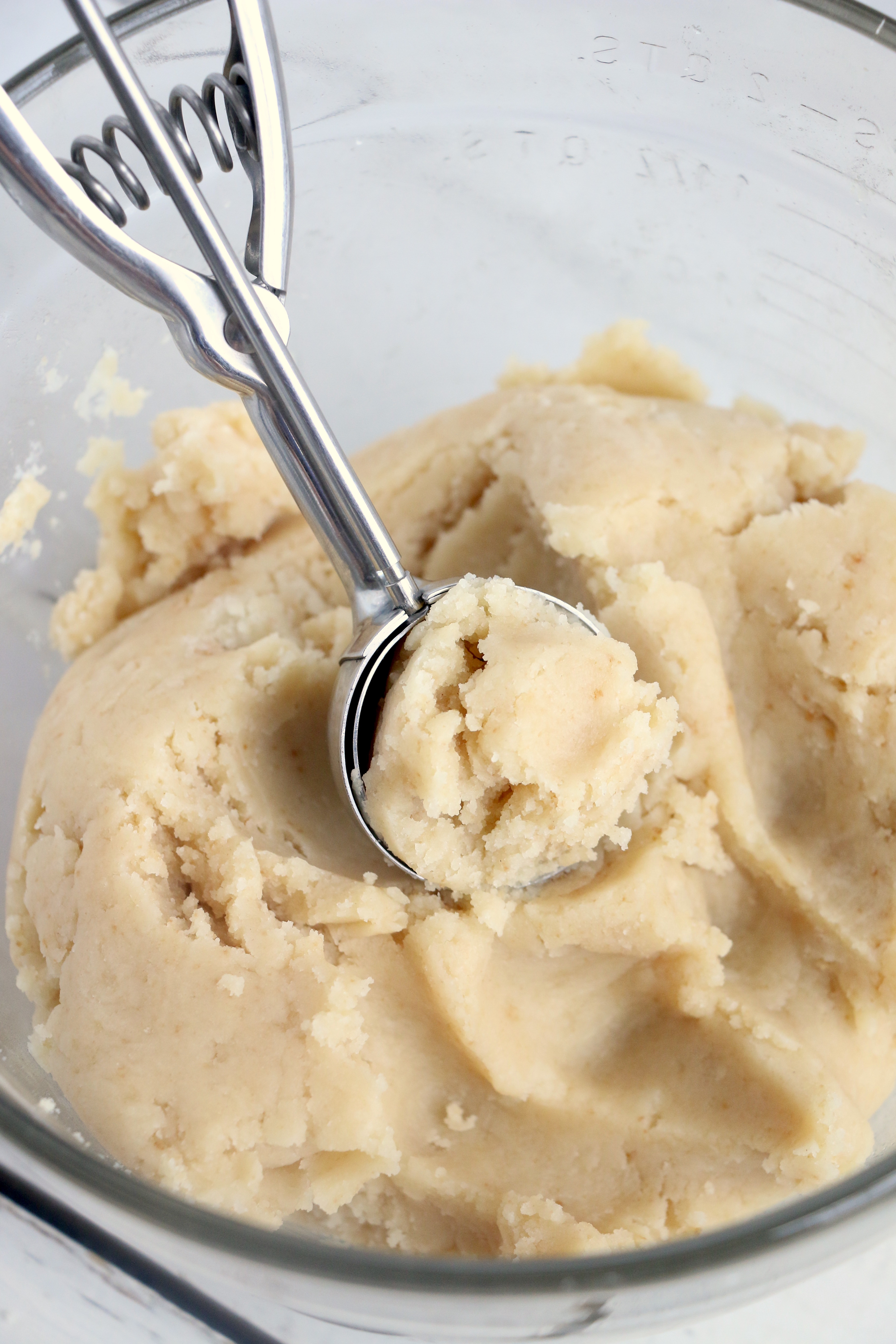 Using an ice cream scoop to form cake balls