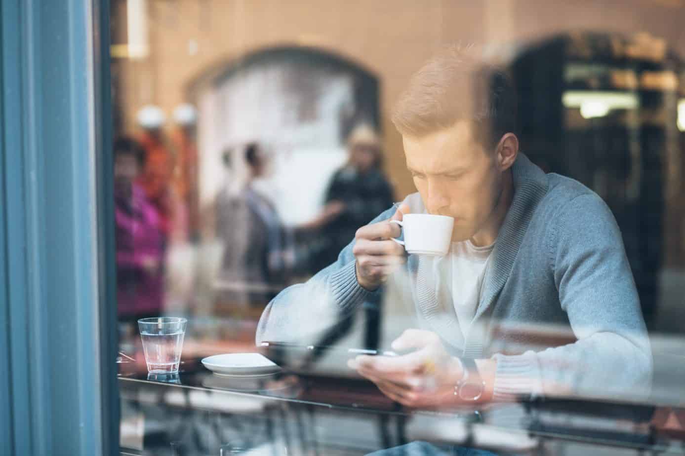 A man drinking coffee