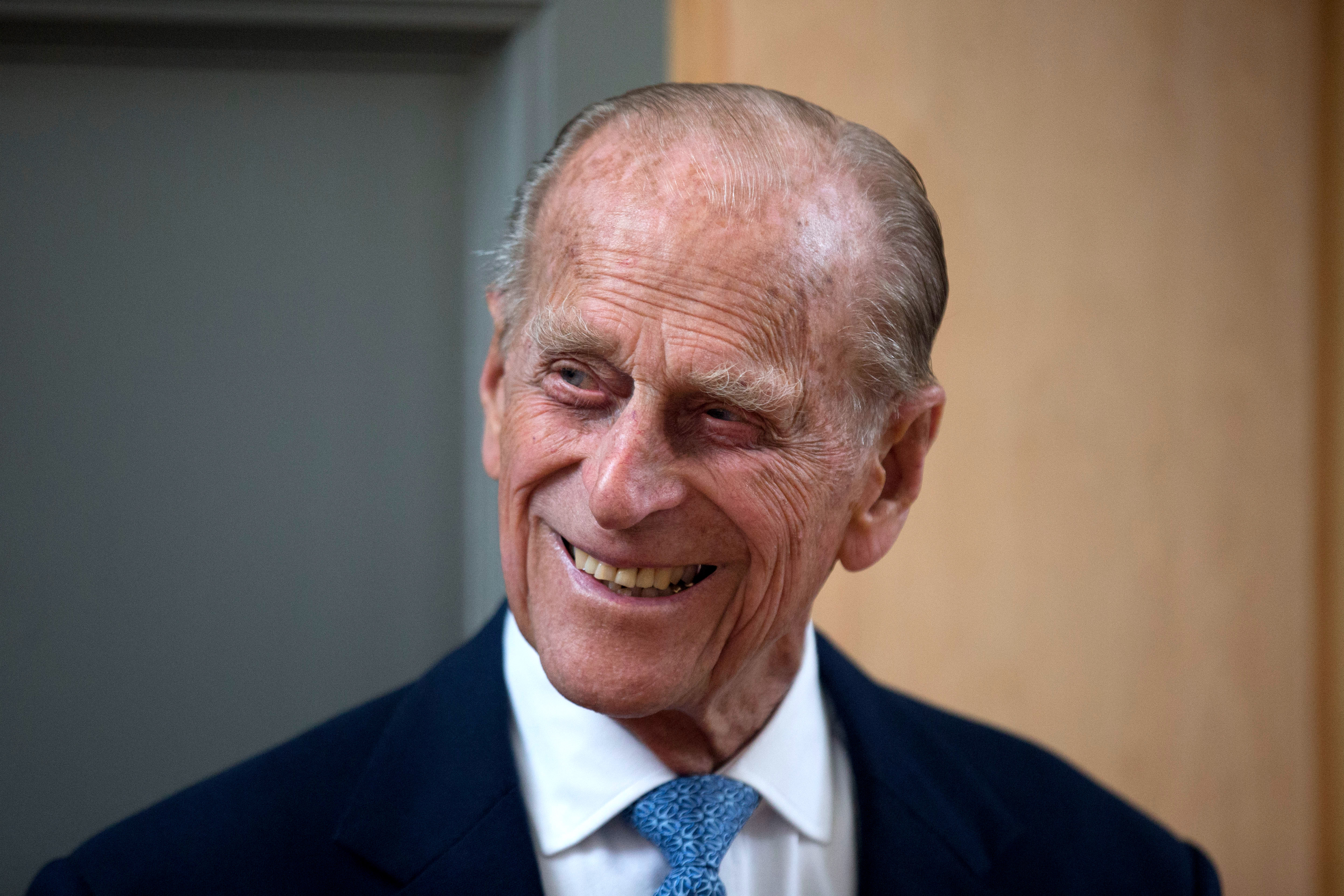 Prince Philip, Duke of Edinburgh, smiles.