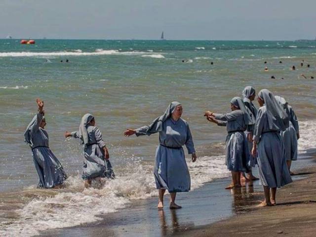 Nuns at the beach