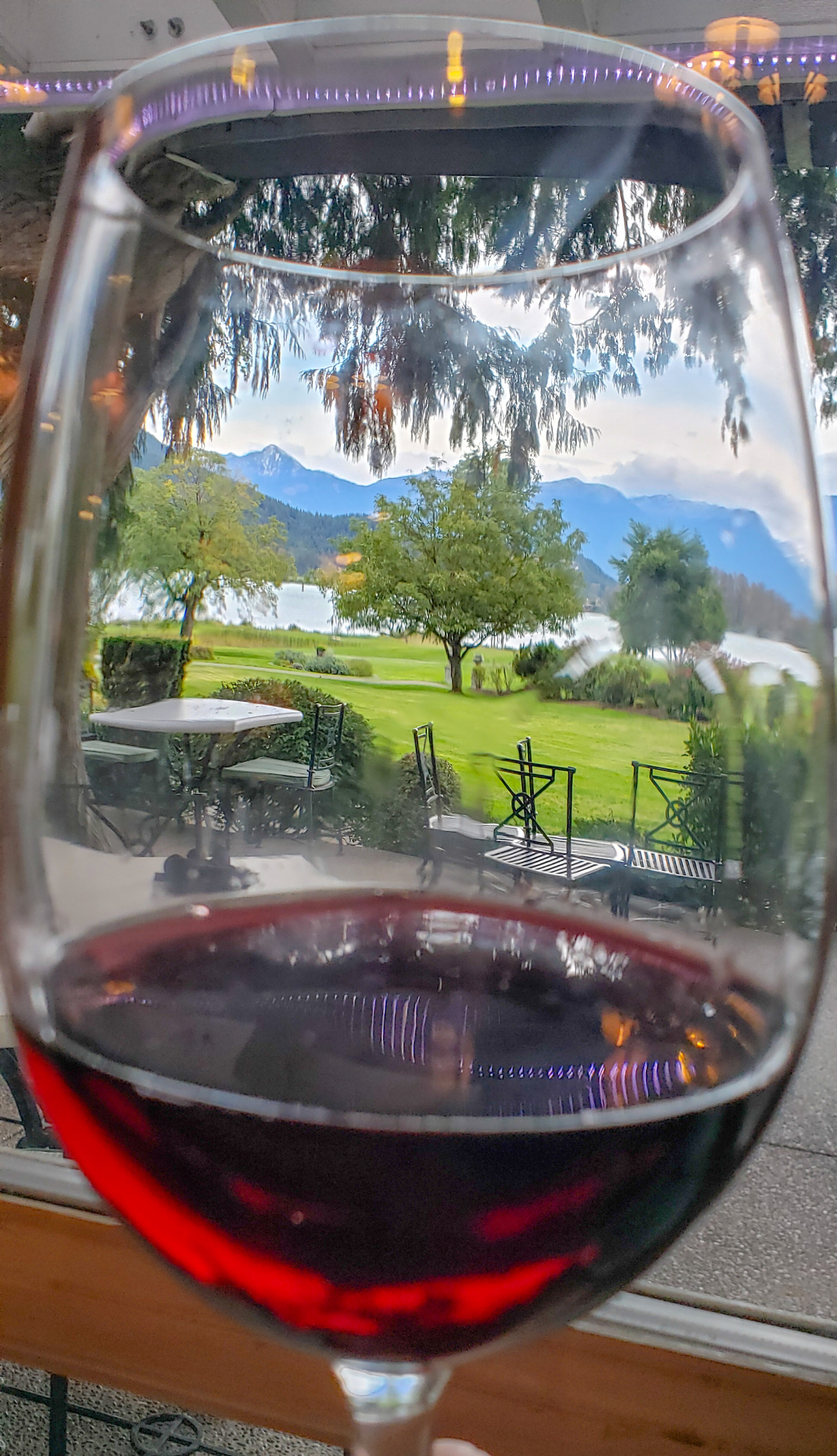 River's Edge golf course view through a wine glass