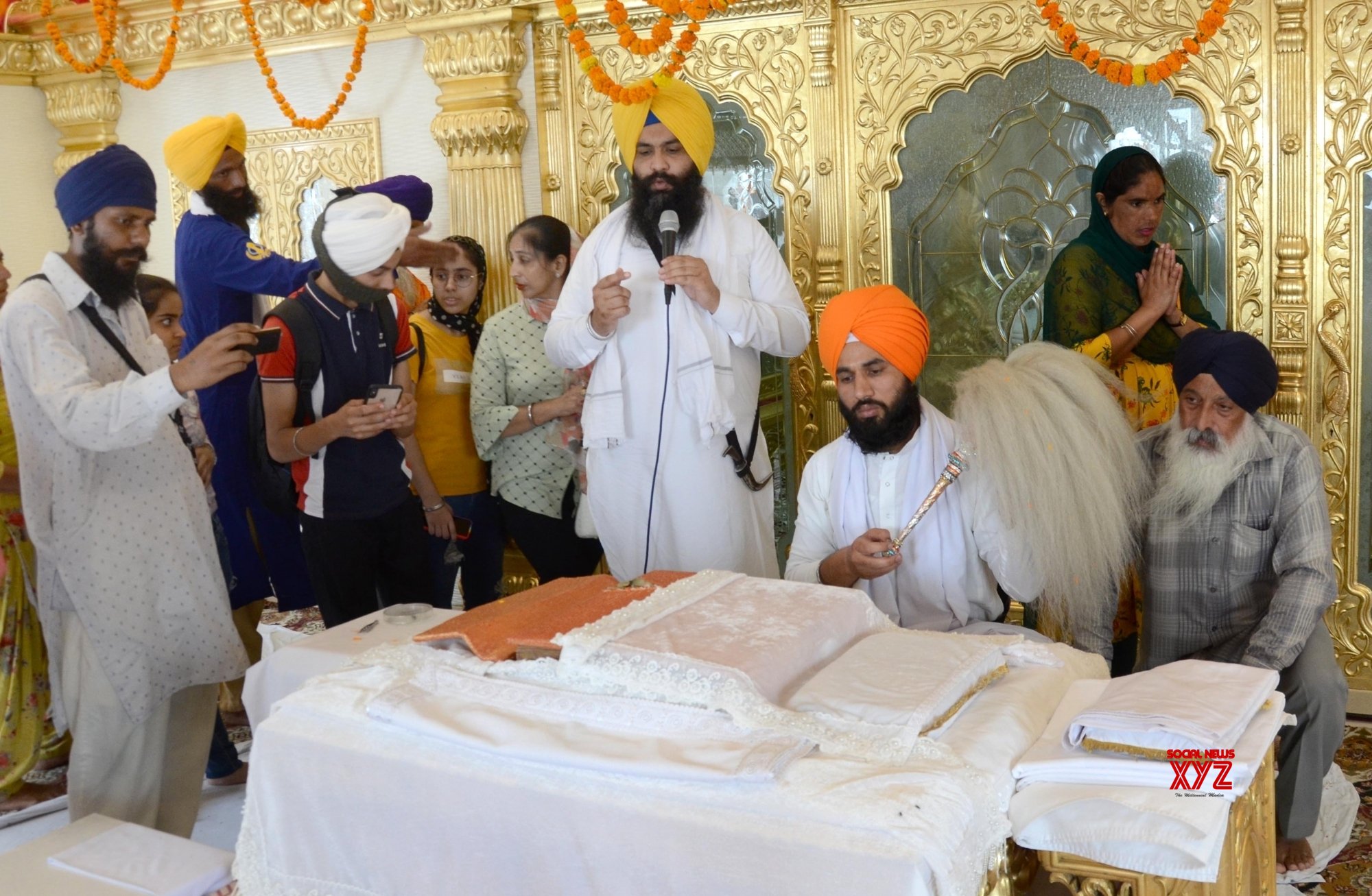 Amritsar Sikh Priests Display An Edition Of Sikh Holy Book Sri Guru Granth Sahib Ji That Was Hit By A Bullet During Operation Blue Star Of 1984 In Amritsar Gallery Social