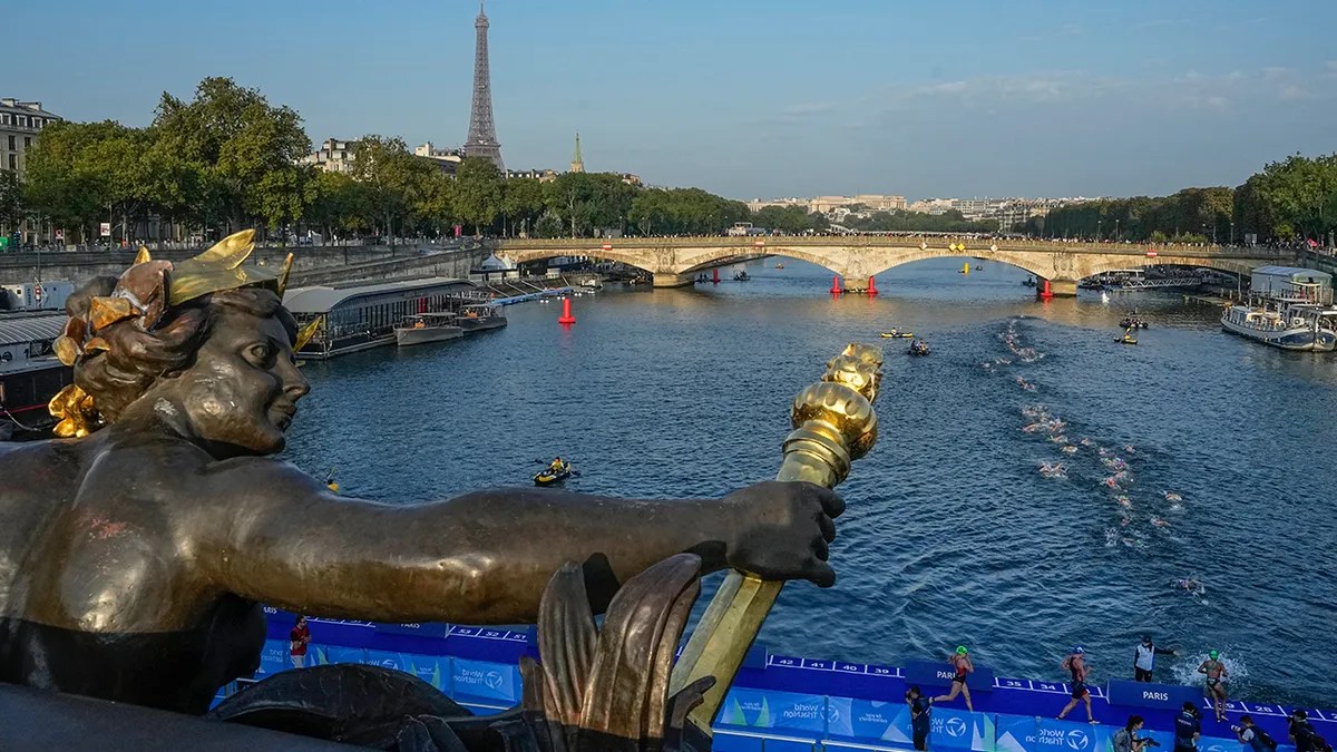 World's top female triathletes swim in Paris' Seine River ahead of next