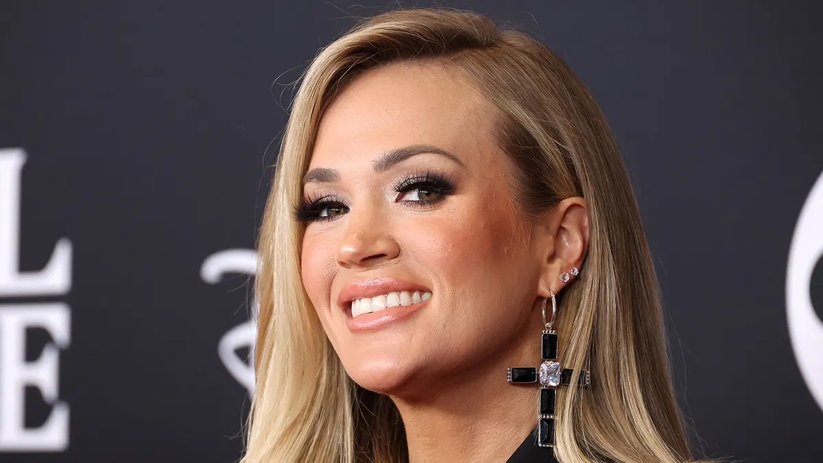 Carrie Underwood enjoys Christmas by 'watching it through my sons' eyes