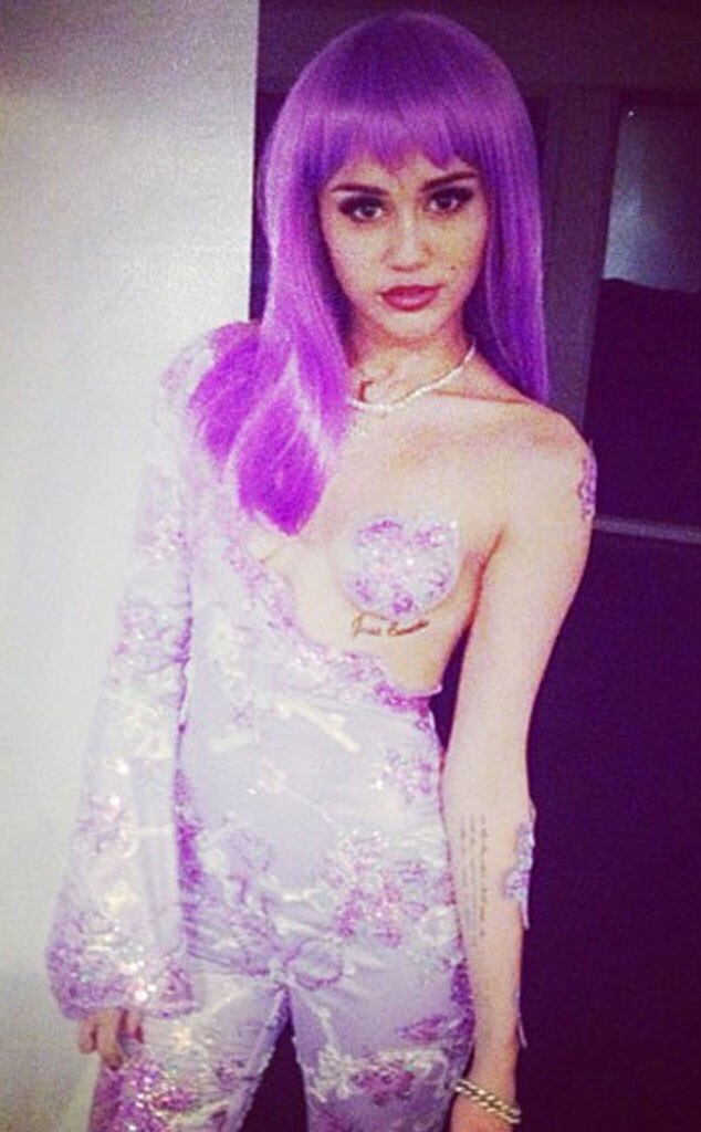 Miley Cyrus Wears Nipple Pasty, Dresses Up as Lil' Kim at the 1999 MTV