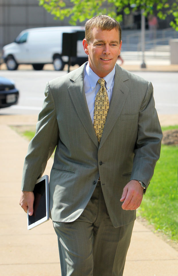 August Busch IV arrives at court in St. Louis for Katz v AB trial today