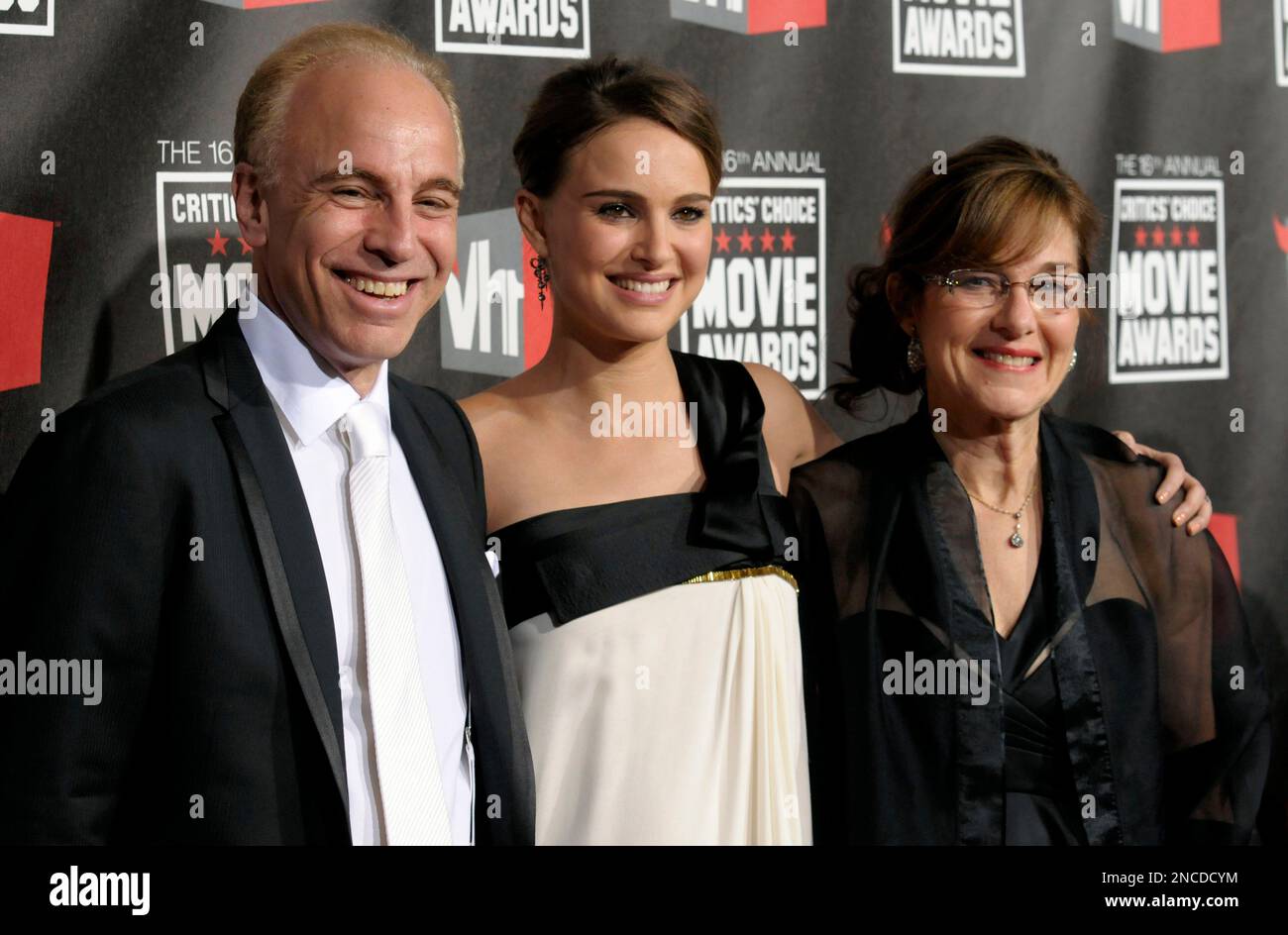 Natalie Portman, center, and her parents, Avner Hershlag, left, and