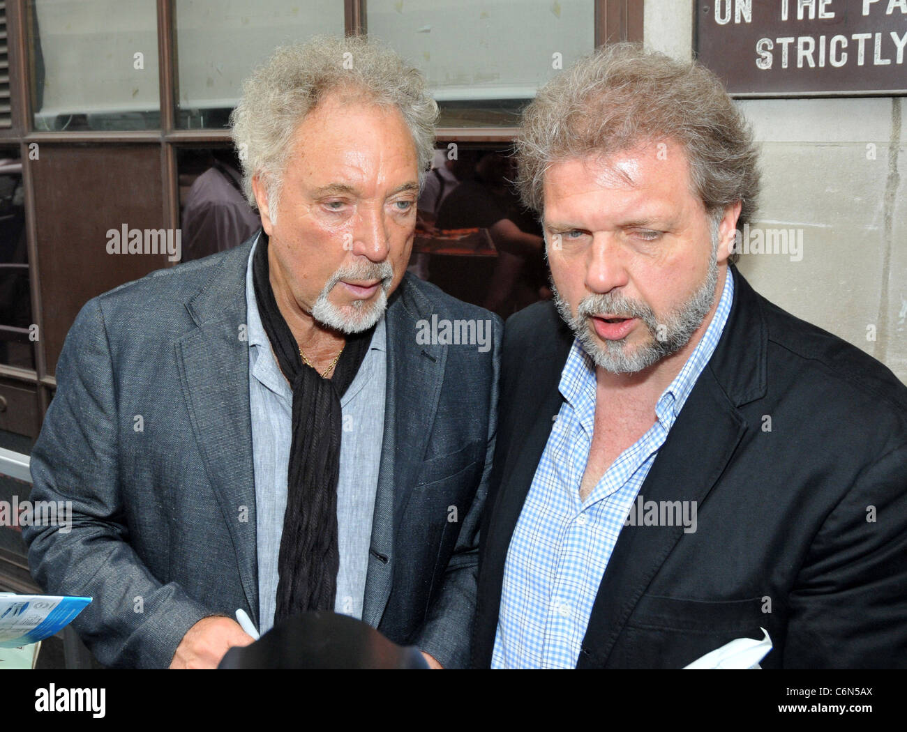 Tom Jones and his son Mark Woodward outside the BBC Radio One studios London, England 27.07.10