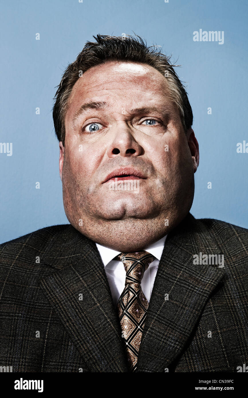 Businessman looking shocked Stock Photo Alamy