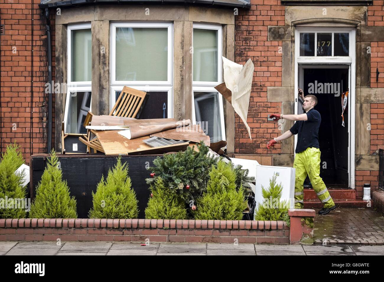 A man throws out furniture hires stock photography and images Alamy