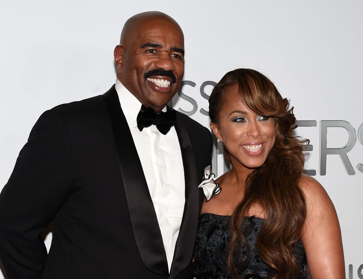 Steve Harvey & Wife Marjorie Pose in Face Masks after Heading Home to