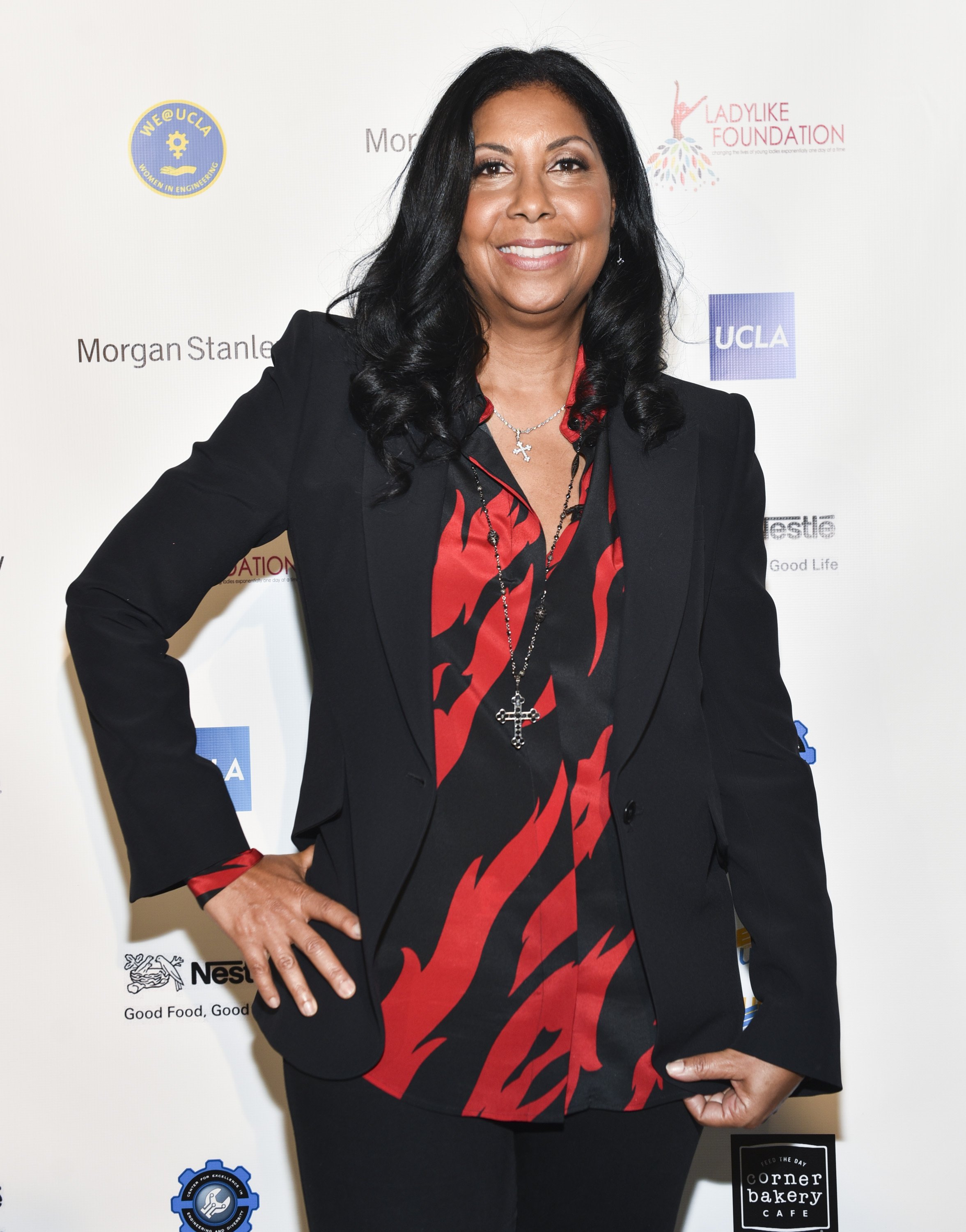 Cookie Johnson Relaxes at Home with Her Yorkshire Terrier by Her Side