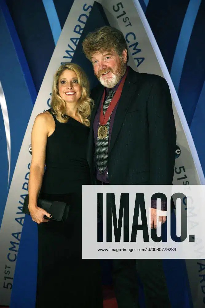 Mac McAnally and his wife Shawna walk the red carpet as they arrive for the 51st Annual Country