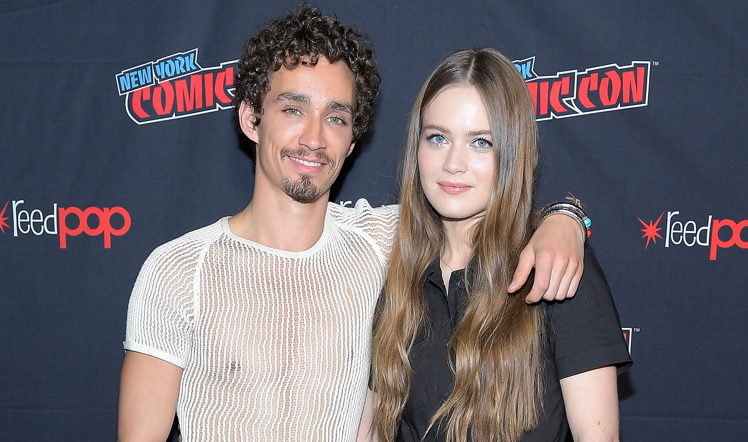 Mortal Engines’ Robert Sheehan Wears Sheer Shirt & Sarong to Comic Con