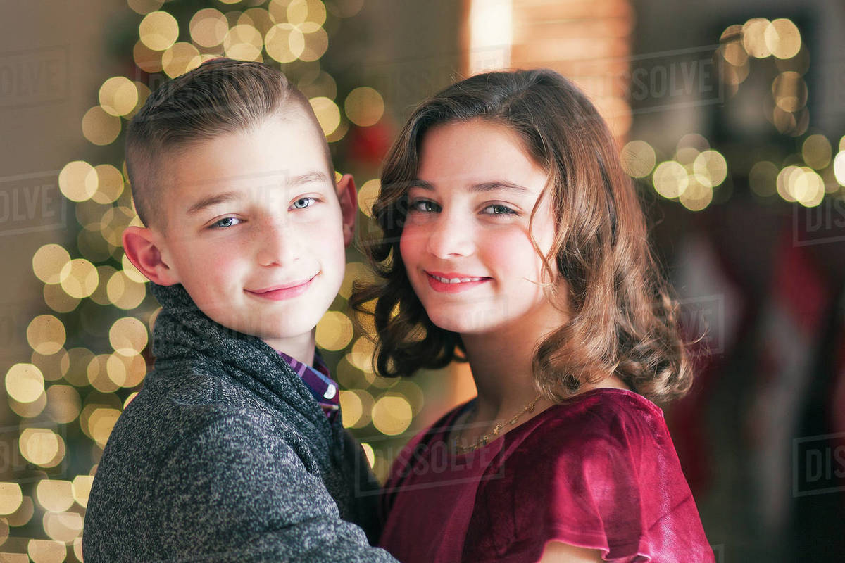 Twin brother and sister at Christmas Stock Photo Dissolve