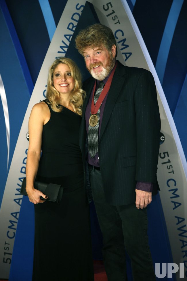 Photo Mac McAnally and Penelope Campbell arrive for the 2017 CMA Awards in Nashville