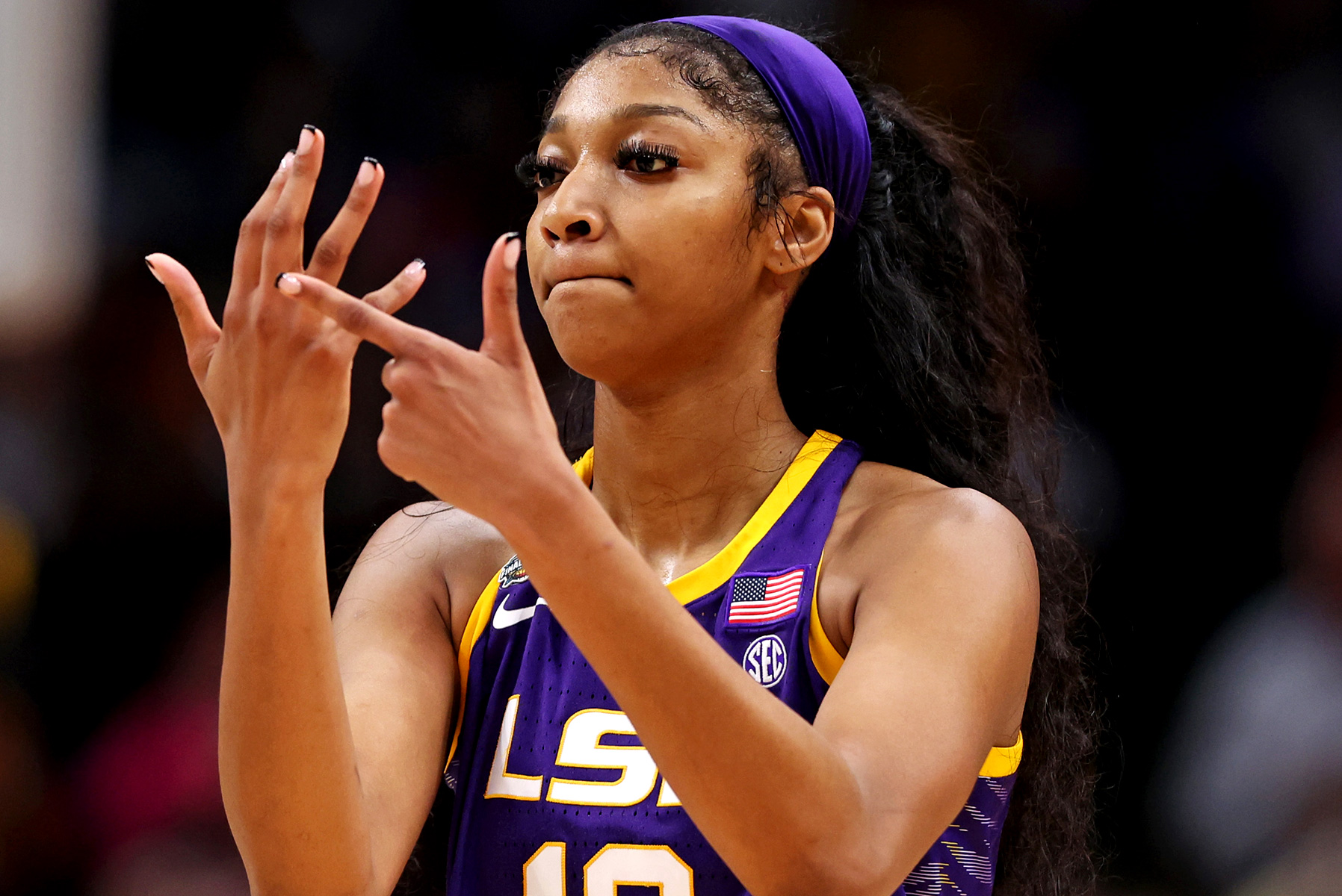 Angel Reese recreates the infamous hand gesture in video during the LSU