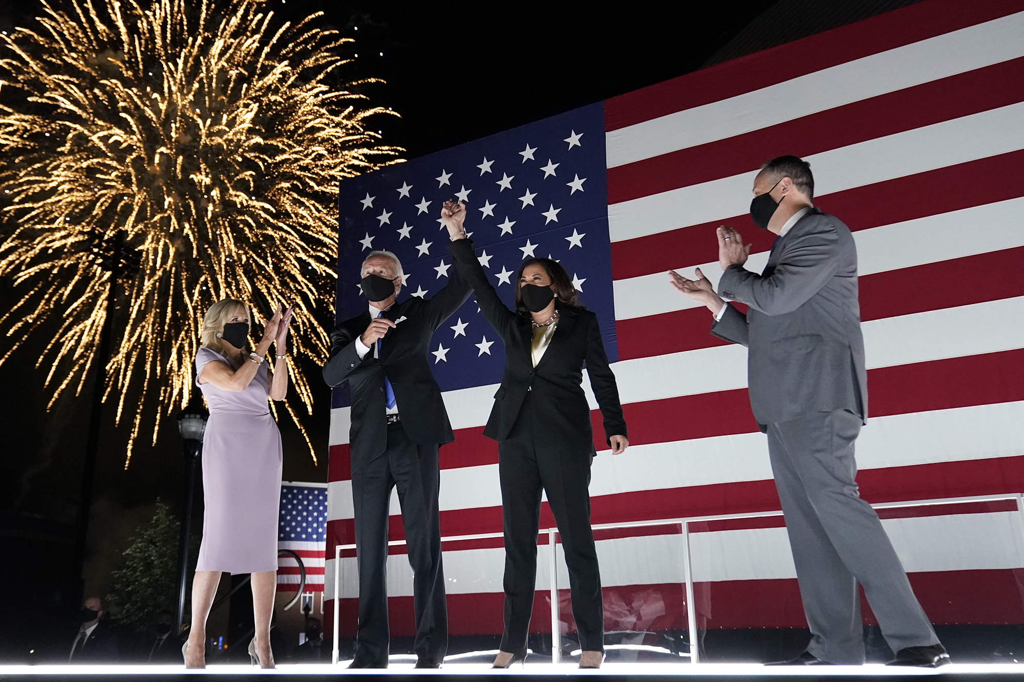 Joe Biden and Kamala Harris join supporters outside the Chase Center to