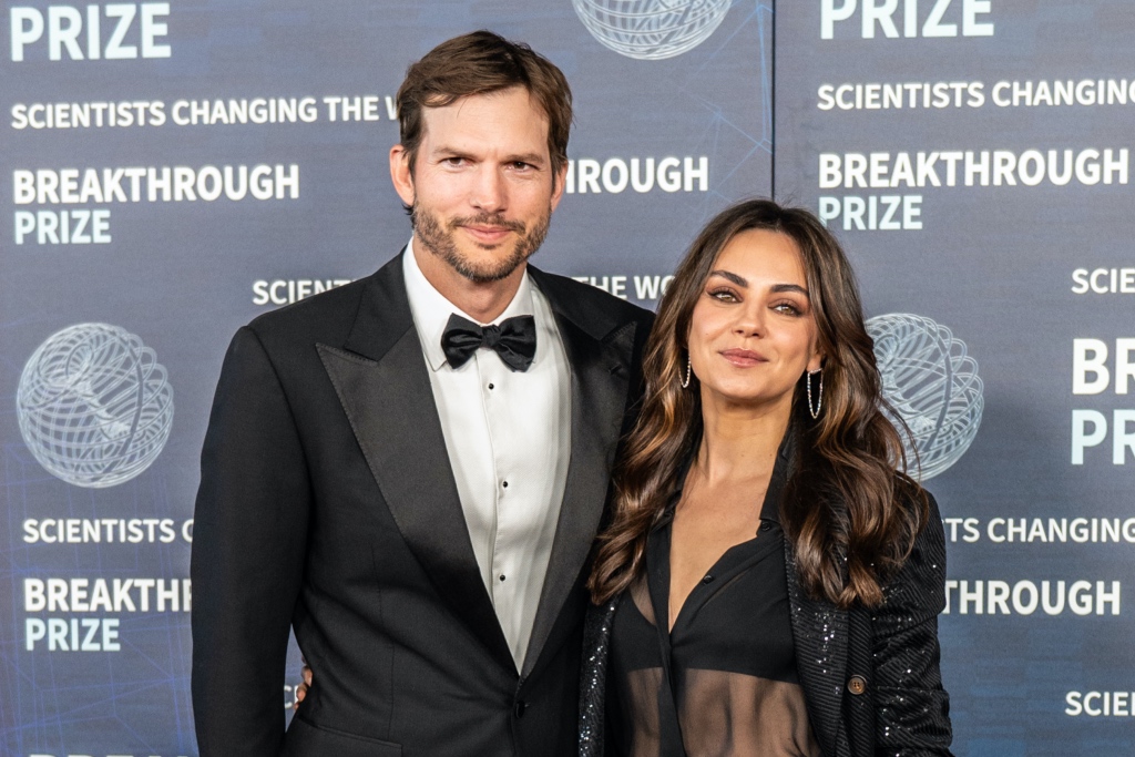 Mila Kunis Wears Sheer Blouse & Pumps at Breakthrough Prize Ceremony