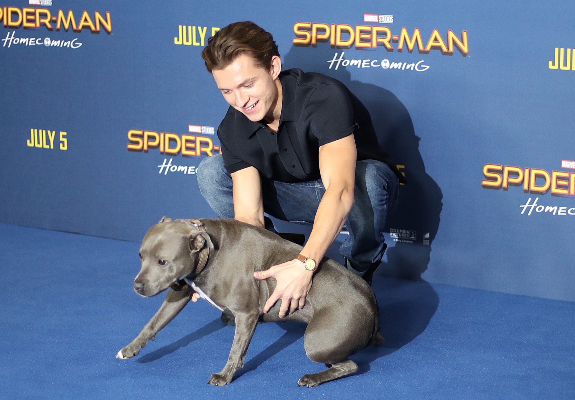 Tom Holland had *the best* date on the "SpiderMan" blue carpet his