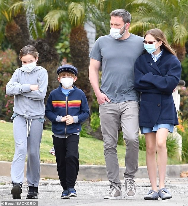 Ben Affleck embraces his daughter Violet as he takes his children for a