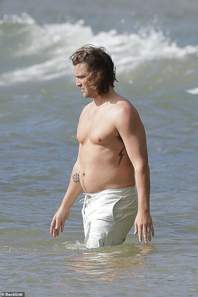 Yellowstone actor Luke Grimes enjoys a beach day with his wife Bianca