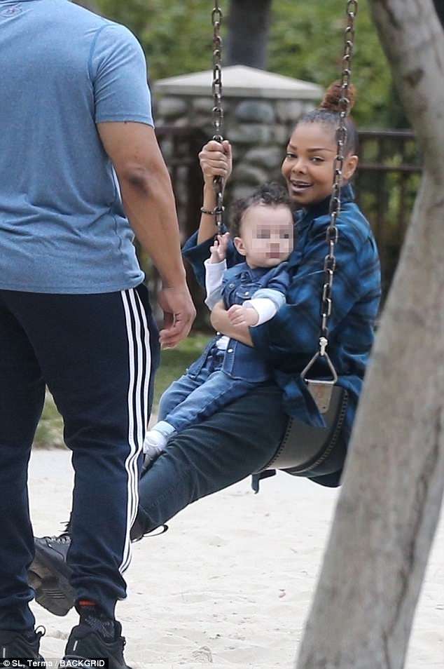 Jackson sports flannel top and jeans for lowkey Mother's Day