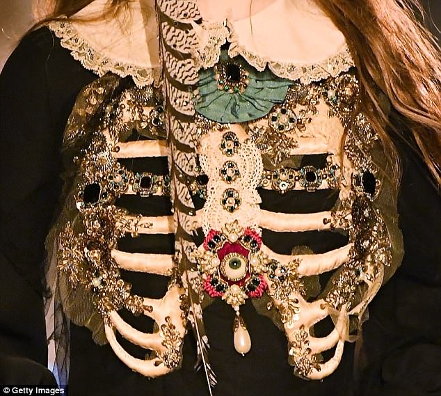 Gucci model wore glitzy gemcovered RIBCAGE down the runway designed by