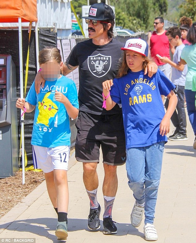 Red Hot Chili Peppers' Anthony Kiedis looks like a cool dad at Malibu