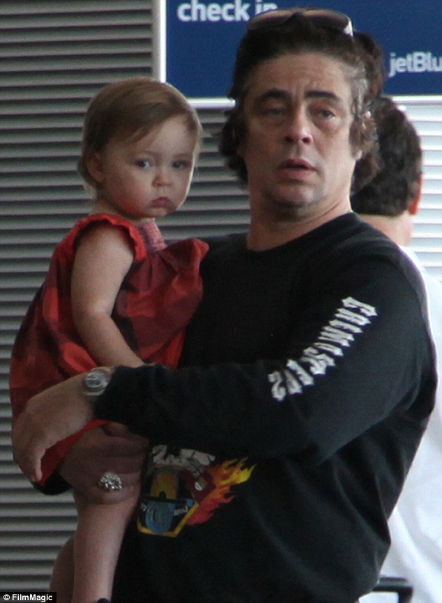 Benicio Del Toro coos over baby Delilah as actor and Kimberly Stewart