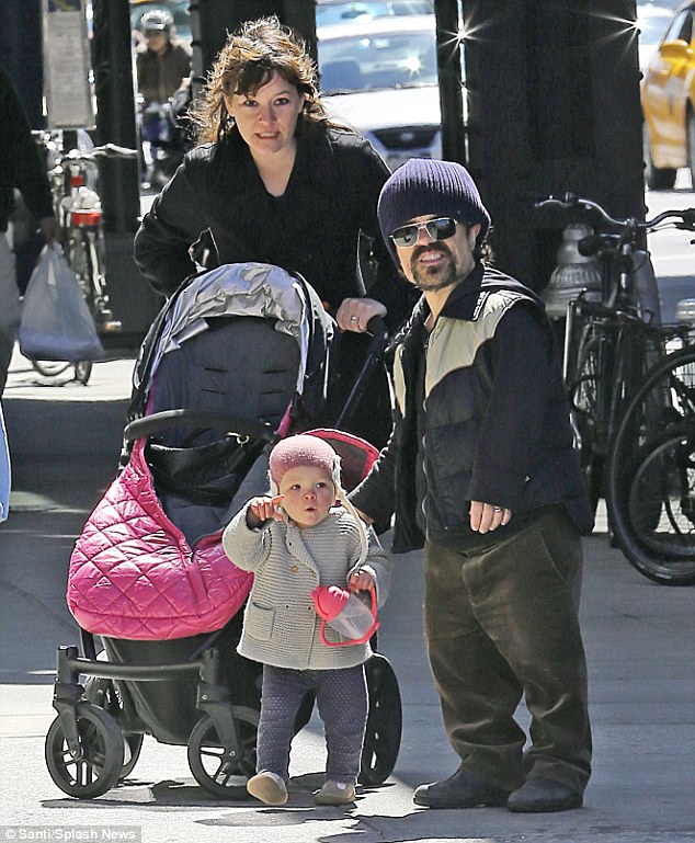 Game Of Thrones star Peter Dinklage holds his little princess daughter