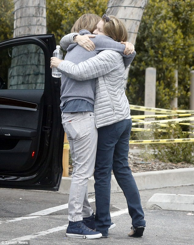 Jodie Foster gives her expartner Cydney Bernard a warm embrace during