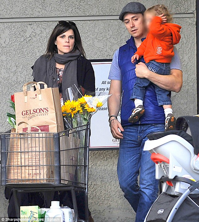 Neve Campbell denies she is expecting second child with partner JJ