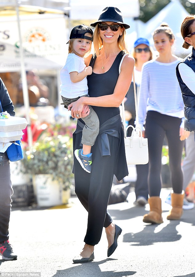 Giuliana Rancic and son Edward play it cool in black hats at the LA