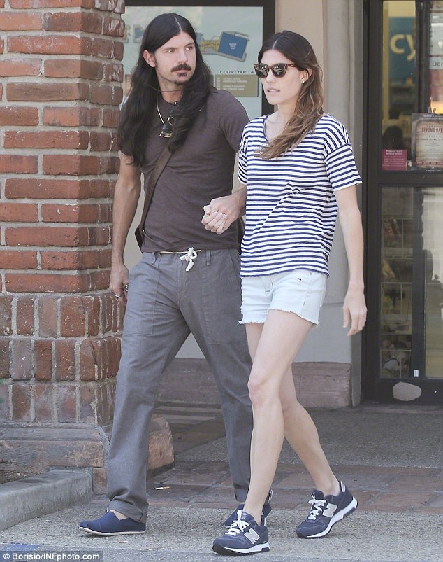 Dexter's Jennifer Carpenter and boyfriend Seth Avett are expecting a