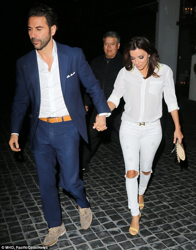 Eva Longoria gets handson with boyfriend Jose Baston as they step out