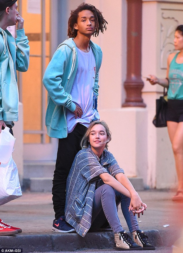 Jaden Smith holds hands with a mystery girl as they take a stroll