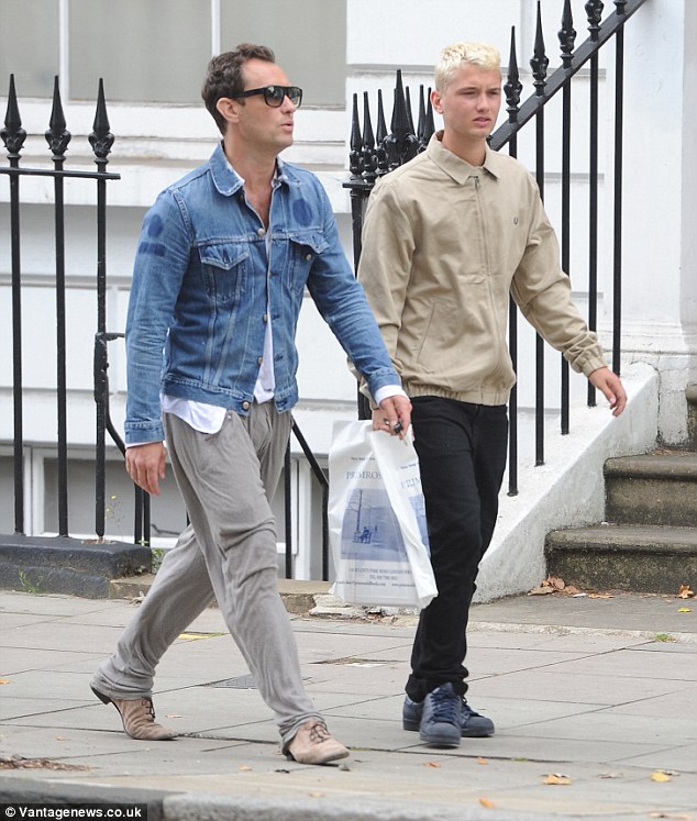 Jude Law enjoys some quality time with lookalike son Rafferty in London