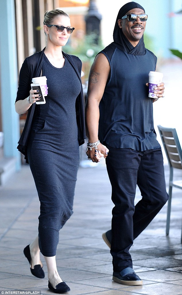 Eddie Murphy's pregnant girlfriend Paige Butcher shows off baby bump