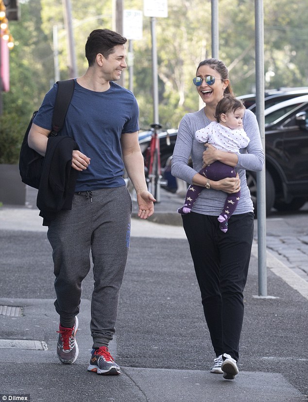 Adam Garcia cooes over baby girl Arya before Singin' In The Rain