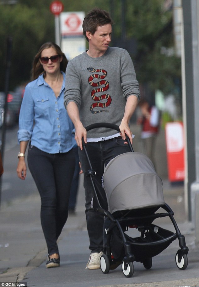 Eddie Redmayne cuts a casual figure as he enjoys family day out with