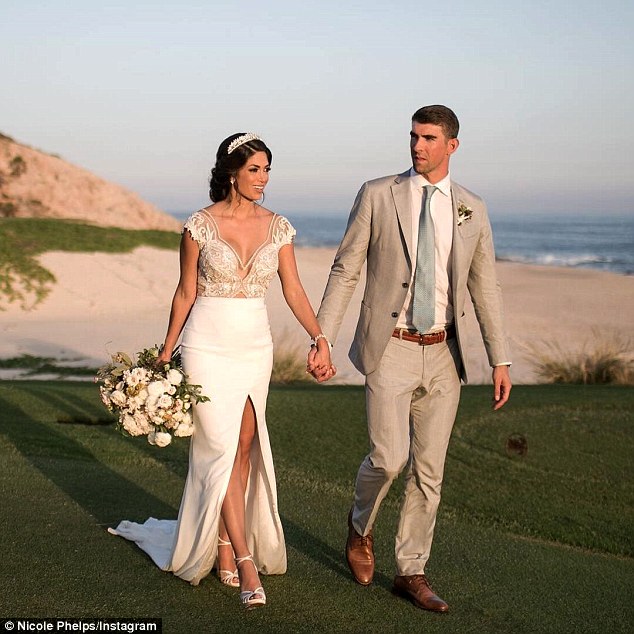 Michael Phelps shares first picture of his secret wedding to Nicole