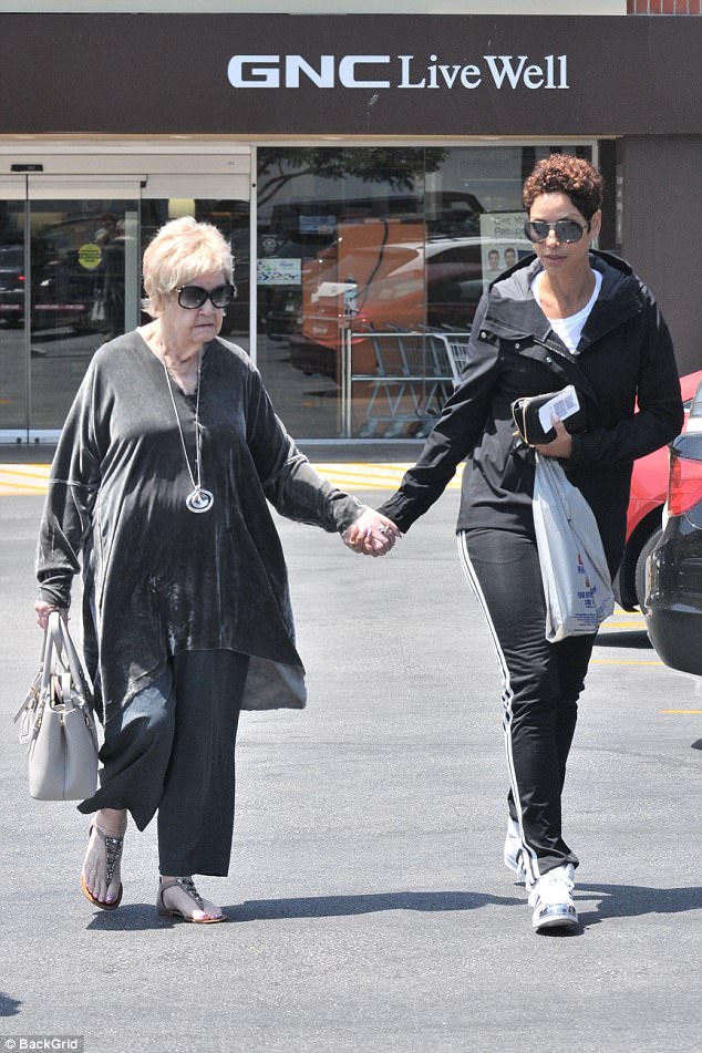 Nicole Murphy holds hands with her mom in Beverly Hills Daily Mail Online