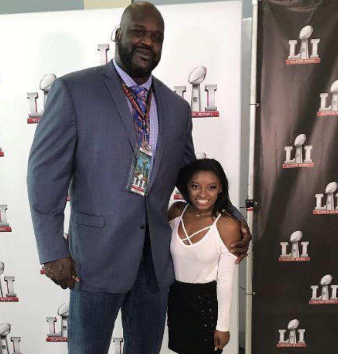 Shaq holding his daughter Simone r/ShaqHoldingThings